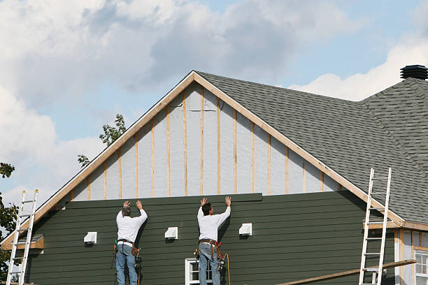 Professional Siding Installation technician working in Clinton, PA